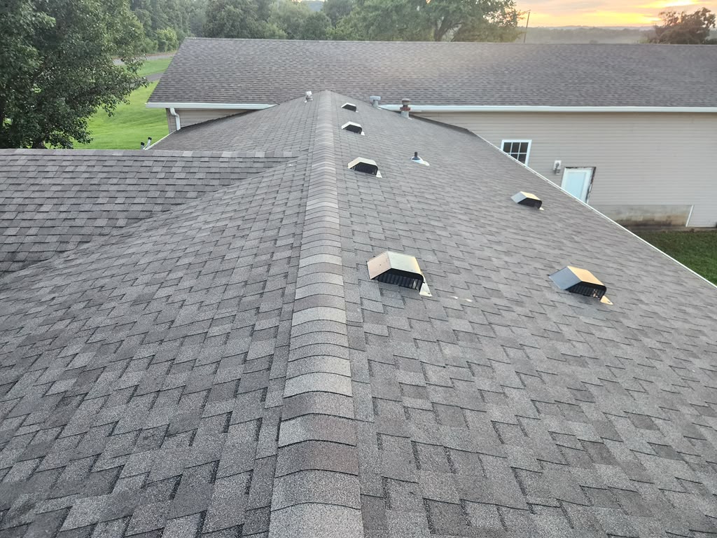 Completed residential roofing project by Elite KY Services Construction in West Point Kentucky