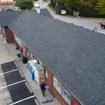 TAMKO Rustic Black roof installation and 6-inch seamless gutters on a gas station in Louisville KY 40220 by Elite KY Services Construction