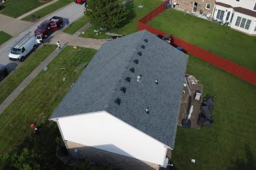 Roof replacement with new gutters and window wraps in Louisville KY 40228 by Elite KY Services Construction