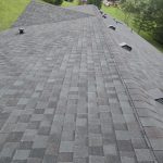 TAMKO Black Walnut roof replacement with new decking and gutters in Pekin IN 47165 by Elite KY Services Construction